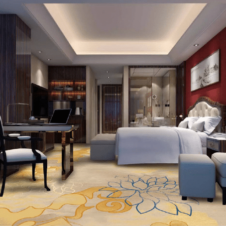 Hotel suite with beige carpet printed with large yellow and blue floral patterns