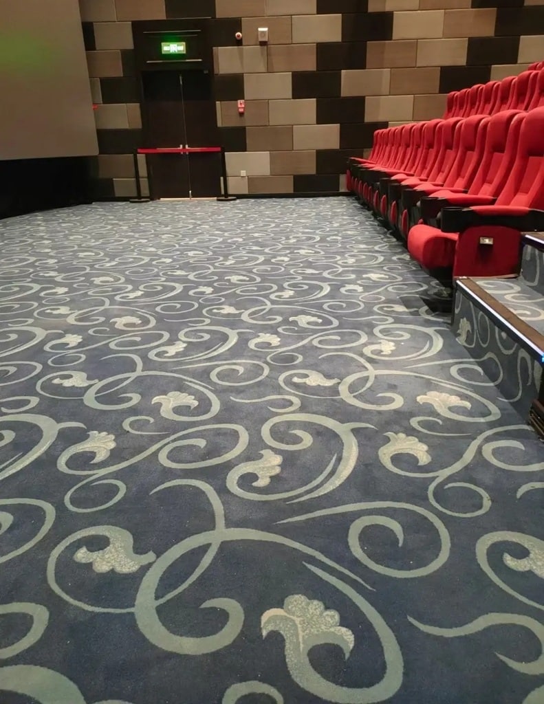 Competitive Factory-Direct Pricing for custom cinema broadloom, auditoriums, and theater lobby flooring projects.