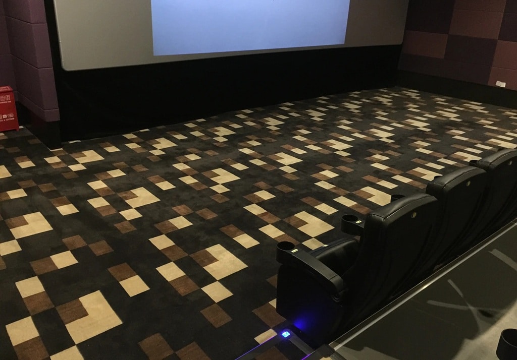 Competitive Factory-Direct Pricing for custom cinema broadloom, auditoriums, and theater lobby flooring projects.