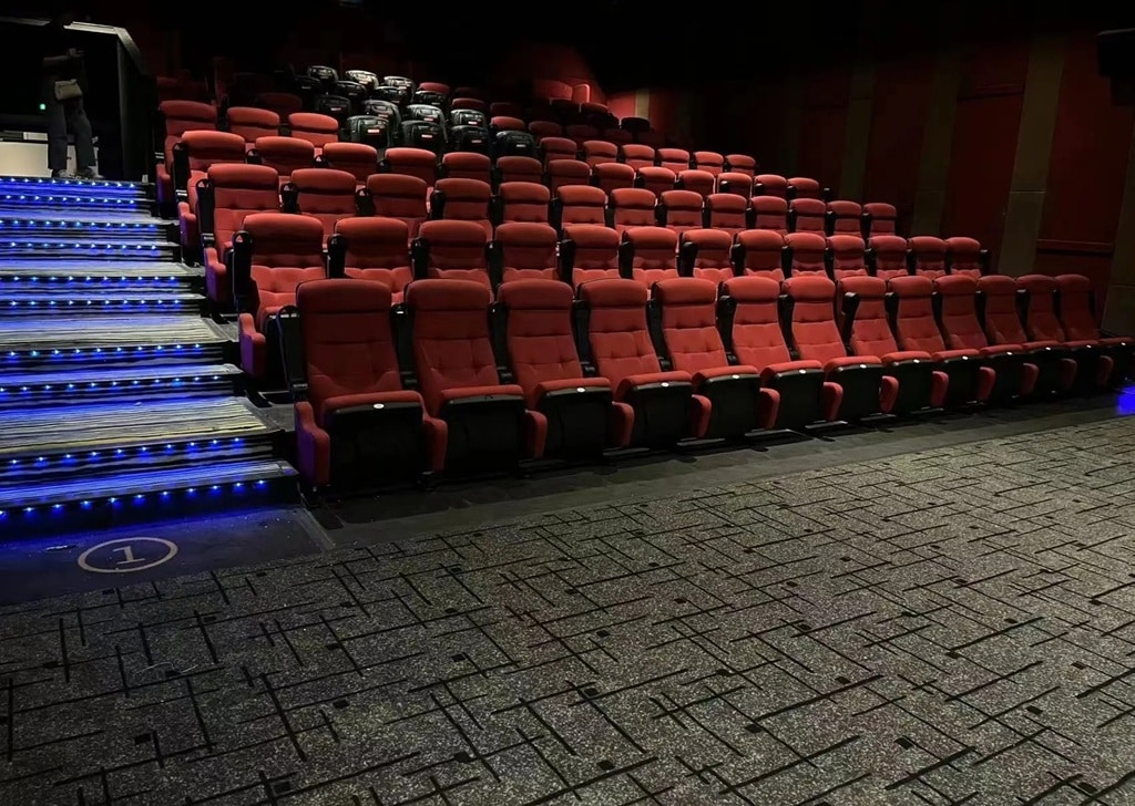 Competitive Factory-Direct Pricing for custom cinema broadloom, auditoriums, and theater lobby flooring projects.