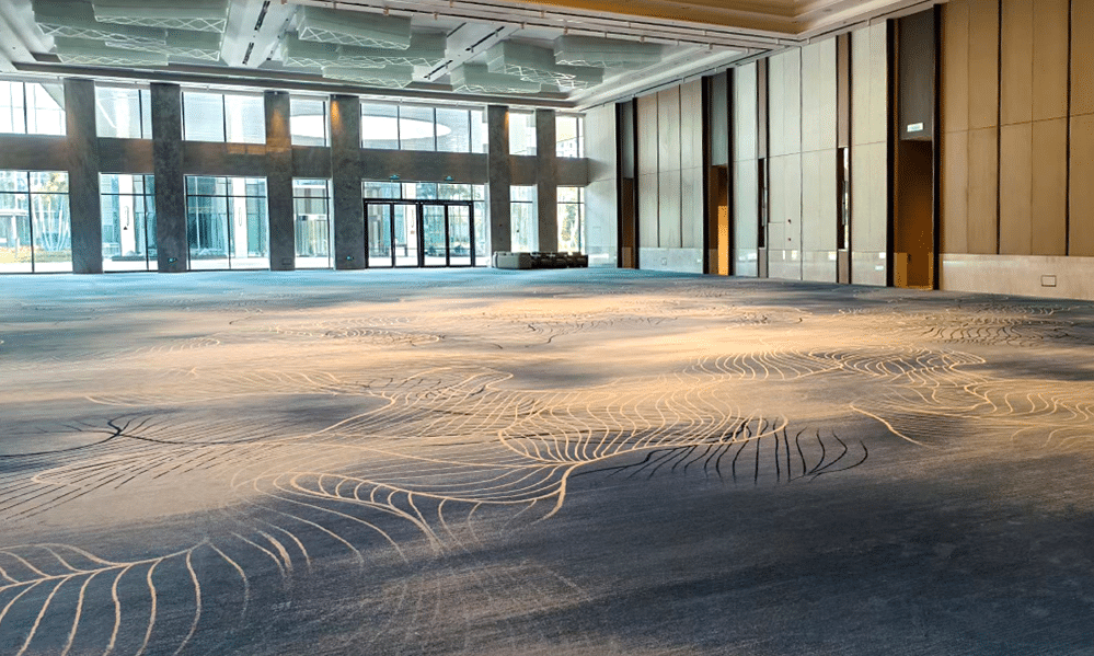 Custom Hand-Tufted wool carpet with jade-inspired patterns in Marriott Jieyang lobby.
