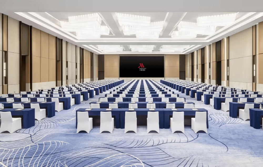 Custom Hand-Tufted wool carpet with jade-inspired patterns in Marriott Jieyang lobby.